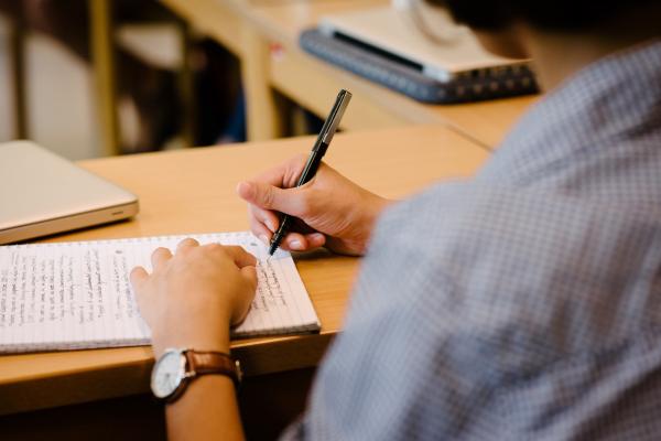 Student Taking Notes