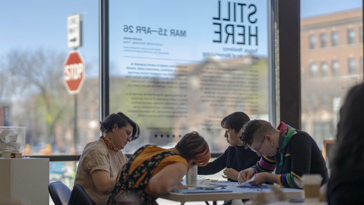 Students sitting at table